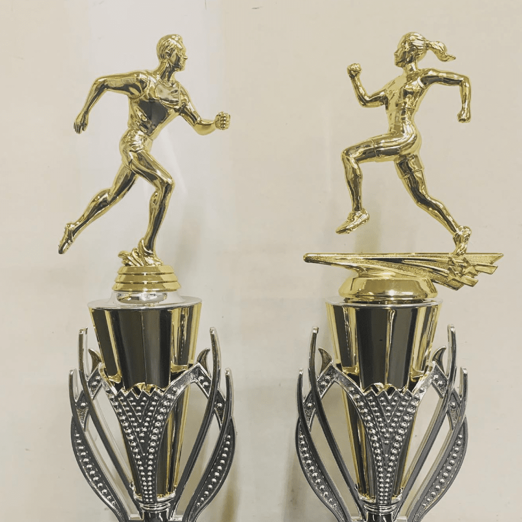 Gold and silver running trophies